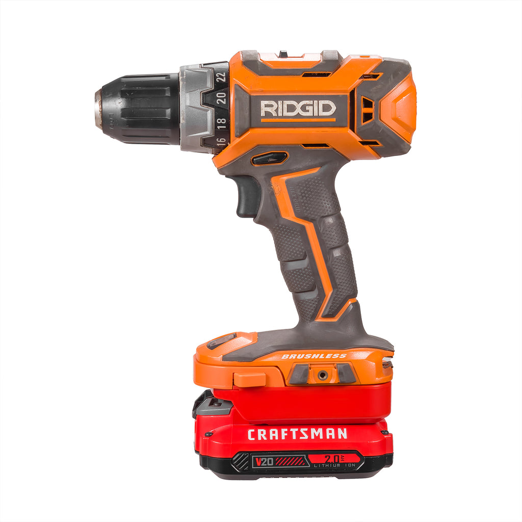 Craftsman 20V to RIDGID 18V battery adapter - side view, installed on a RIDGID drill above the battery