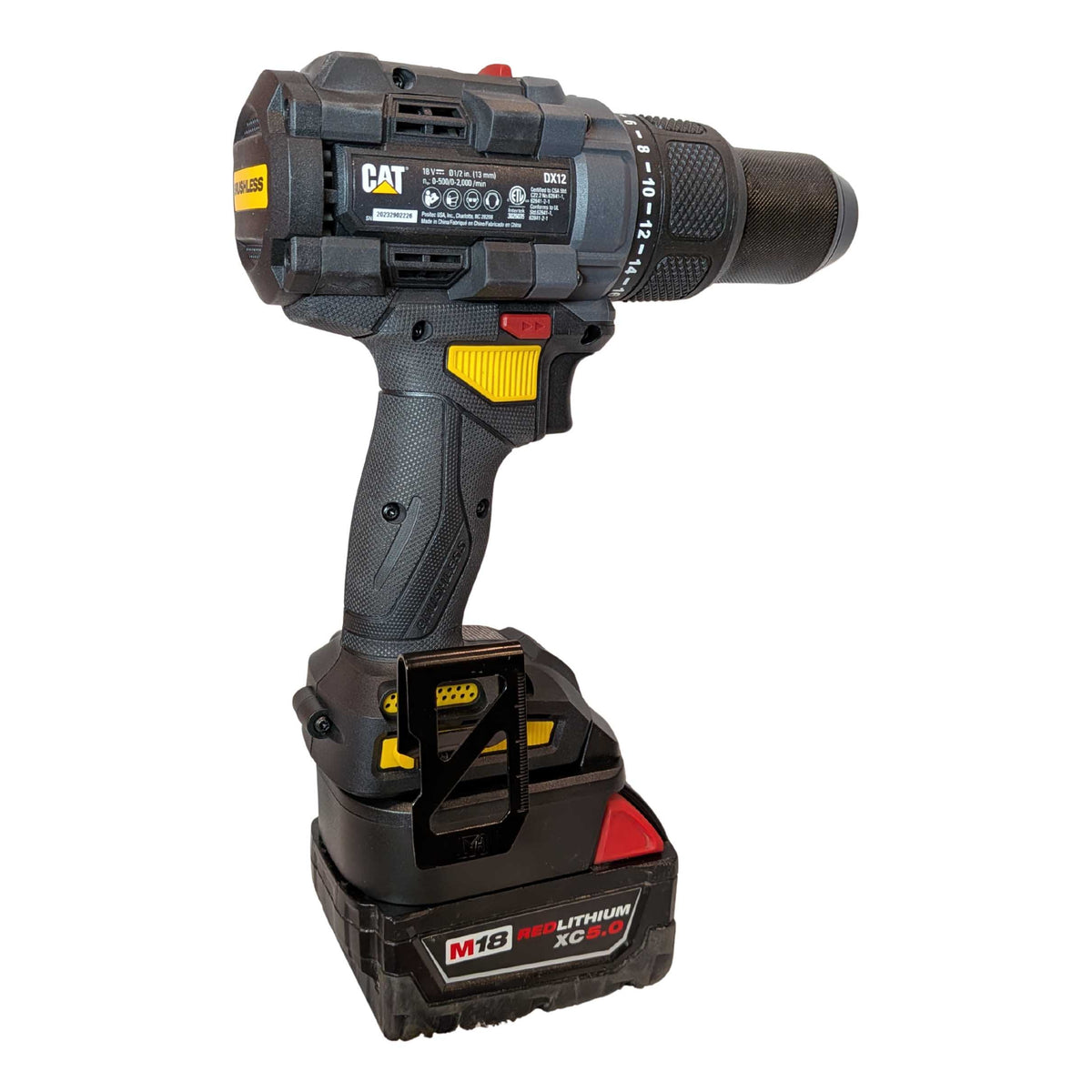 Milwaukee M18 to CAT 18V battery adapter - rear view installed on a drill driver with the battery fitted below