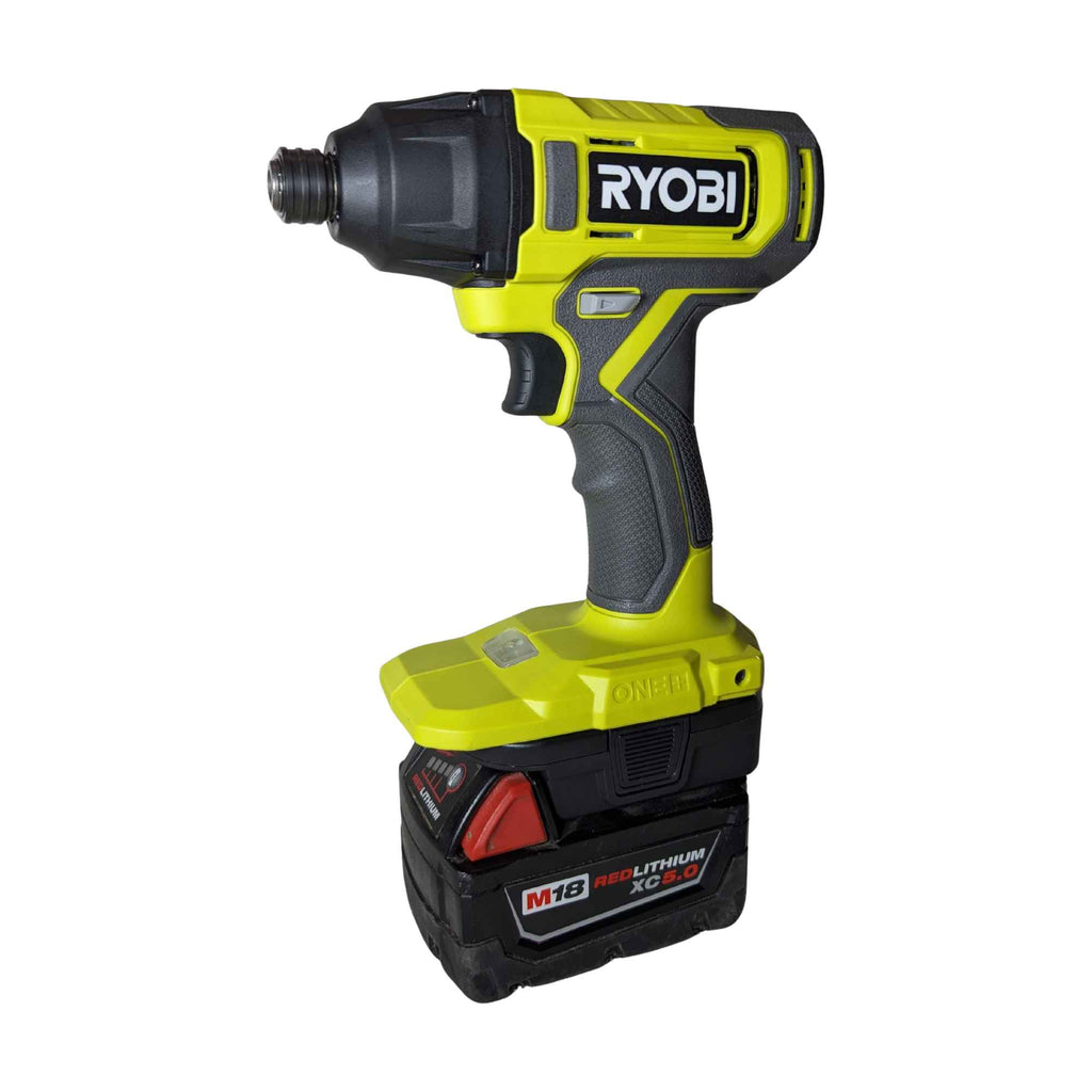 Milwaukee M18 to Ryobi 18V ONE+ battery adapter - installed on a Ryobi impact driver with the Milwaukee battery attached
