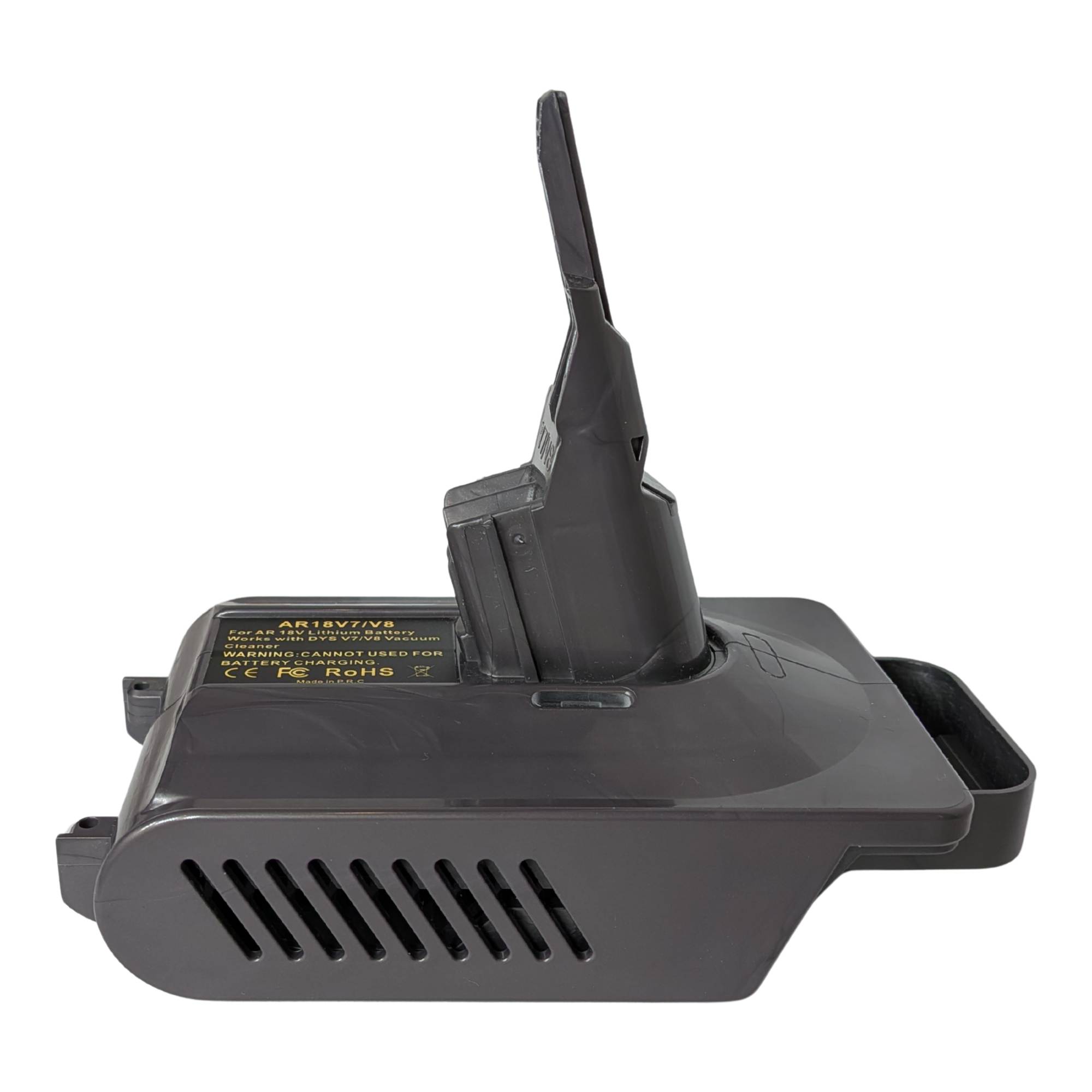 RIDGID 18V to Dyson V8 battery adapter - side view showing the Dyson tool-side stem, vent grille and warning label