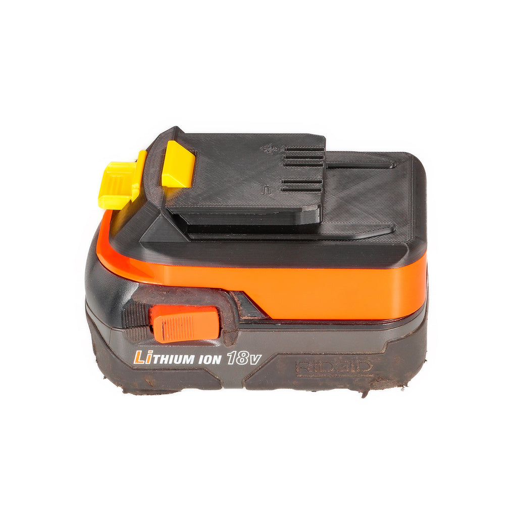 RIDGID 18V to WEN 20V battery adapter - fitted to the battery, WEN tool-side connection facing up, release button at the side